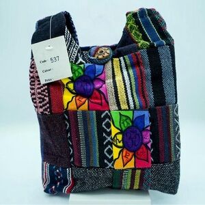 Kathmandu Small Tribal stitch Crossbody bag  with Flower Design